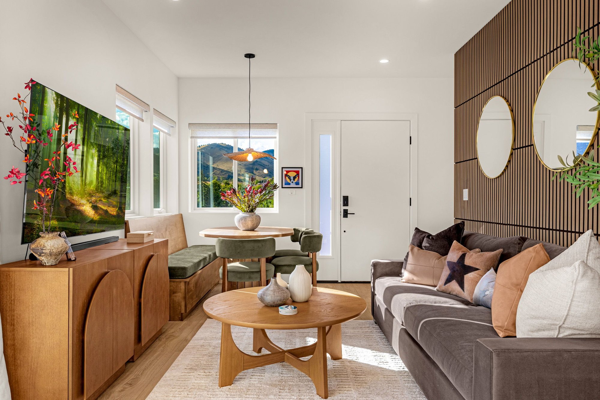 Lower unit living room with a vertical wood slat feature wall