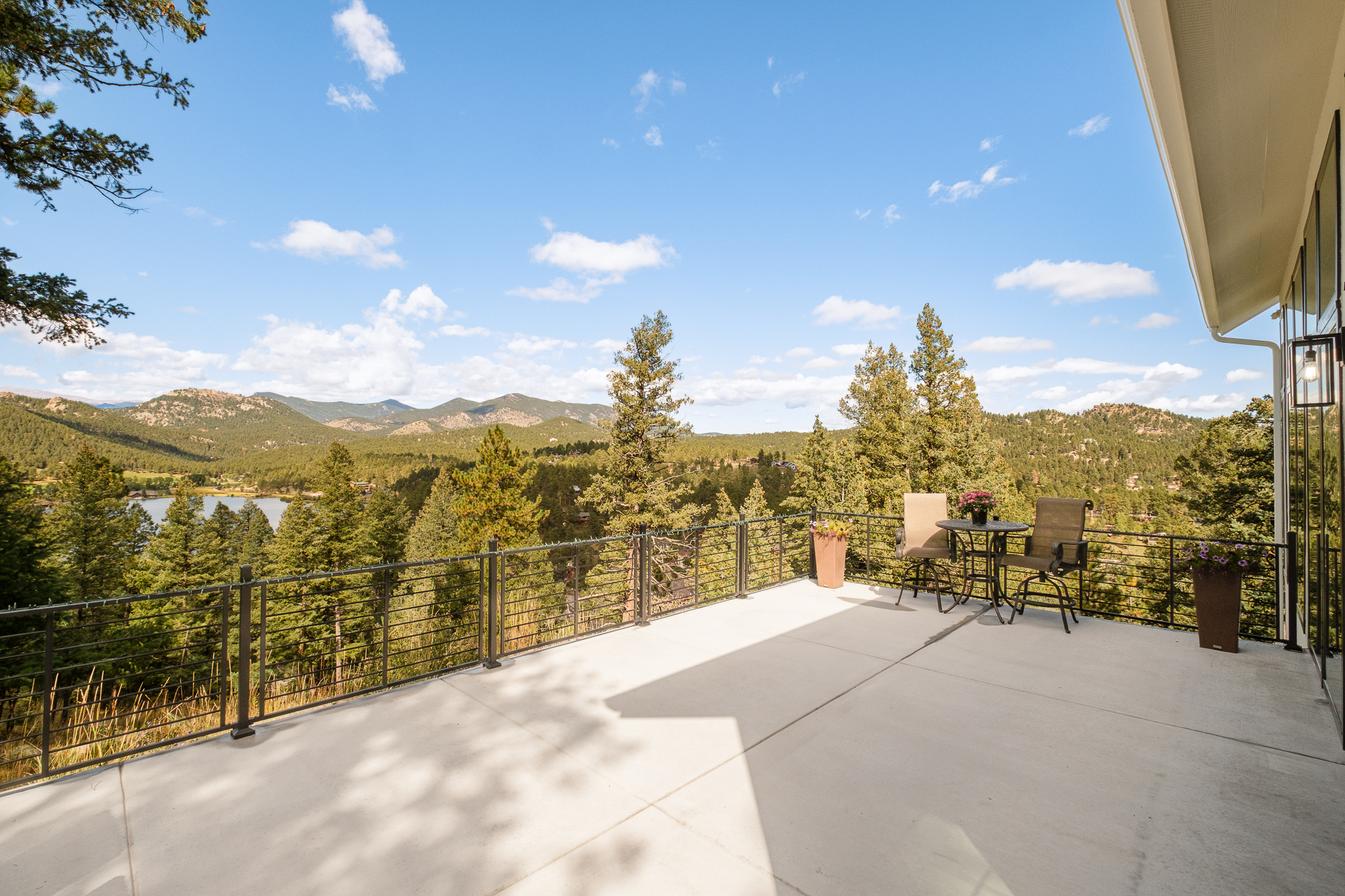 Mountain-view terrace overlooking Evergreen Lake